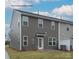 This home features a rear patio area, neutral colors, and double pane windows at 505 Mt. Mitchell Ave # 505, Gastonia, NC 28052