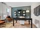 A modern office with stylish decor, featuring wood-look floors and elegant shelving accents at 5248 Hatcher Creek Rd # 49, Charlotte, NC 28215