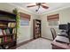 Cozy bedroom featuring hardwood floors, natural light, and stylish built-in bookshelves at 5467 Whiting Ave, Kannapolis, NC 28083