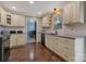 Updated kitchen featuring sleek appliances, stylish cabinetry, and abundant counter space at 5467 Whiting Ave, Kannapolis, NC 28083