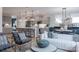 Open-concept living space with a modern kitchen, dining area, and comfortable seating, perfect for entertaining at 6020 Chumbley Point Rd # 73, Charlotte, NC 28215