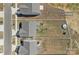 Aerial view of a home showcasing the backyard with a trampoline and approximate property lines at 650 Scotch Meadows Loop, Monroe, NC 28110