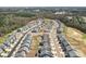 Neighborhood aerial view showcasing a Primary-planned community with well-maintained lawns at 650 Scotch Meadows Loop, Monroe, NC 28110