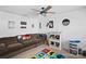 bedroom featuring a brown couch and video game decor at 650 Scotch Meadows Loop, Monroe, NC 28110