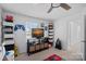 bedroom featuring shelves, toys, and video game decor at 650 Scotch Meadows Loop, Monroe, NC 28110