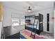 ' bedroom featuring a bunk bed, window, ceiling fan, and dark furniture at 650 Scotch Meadows Loop, Monroe, NC 28110