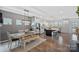 Open concept kitchen and dining area with modern appliances and stylish decor at 650 Scotch Meadows Loop, Monroe, NC 28110