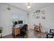 Bright home office with a large window and a desk setup perfect for remote work at 650 Scotch Meadows Loop, Monroe, NC 28110