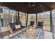 Covered gazebo with comfortable seating and decorative lighting at 6645 Allness Glen Ln, Charlotte, NC 28269
