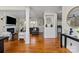 Spacious living room featuring hardwood floors, fireplace, and neutral décor at 6645 Allness Glen Ln, Charlotte, NC 28269