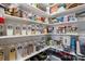 Organized pantry with clear containers and shelves stocked with food items at 6645 Allness Glen Ln, Charlotte, NC 28269