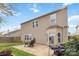 Backyard featuring a patio and spacious lawn perfect for outdoor entertaining and relaxation at 707 Sinclair Dr, Monroe, NC 28112