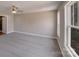Bedroom featuring natural light, ceiling fan, neutral walls, and carpet at 7444 Malabar Rd # 14, Huntersville, NC 28078