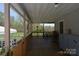 Spacious back porch ideal for outdoor dining and entertaining with storage at 7780 Stokes Ferry Rd, Salisbury, NC 28146