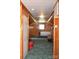 Spacious bonus room featuring wood walls and carpet at 7780 Stokes Ferry Rd, Salisbury, NC 28146