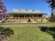 Charming home with a large, inviting wraparound porch perfect for relaxing and entertaining at 7780 Stokes Ferry Rd, Salisbury, NC 28146