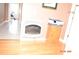 Hallway featuring hardwood floor and white heater at 7780 Stokes Ferry Rd, Salisbury, NC 28146