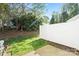 Backyard with white fencing and green grass at 8453 Big Creek Ct, Charlotte, NC 28105