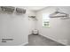 Spacious walk-in closet with ample storage solutions and a window for natural light at 1019 Hostler Ln, York, SC 29745