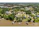 Expansive aerial shot showcasing waterfront homes with docks along a serene lake and forested surroundings at 10270 Lakeshore Dr, Lancaster, SC 29720