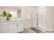 Bright bathroom featuring double sink vanity with step-in shower and neutral color palette at 1036 Hostler Ln, York, SC 29745
