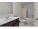 Bathroom features a vanity, toilet, and bathtub with shower at 111 Buoy Ln # 392, Statesville, NC 28677