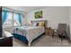 Bright bedroom featuring cozy carpet, a queen-sized bed and light-filled window at 111 Buoy Ln # 392, Statesville, NC 28677