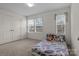 Cozy room with plenty of natural light and plush toys on the bed at 111 Buoy Ln # 392, Statesville, NC 28677