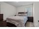 Bedroom with plush bed, side table, and a view of the outdoors at 111 Buoy Ln # 392, Statesville, NC 28677
