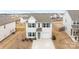 Aerial view of a charming home featuring well-maintained landscaping, driveway, and a welcoming facade at 111 Buoy Ln # 392, Statesville, NC 28677