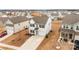 Aerial view showcasing a house with a spacious driveway and pristine lawn in a residential neighborhood at 111 Buoy Ln # 392, Statesville, NC 28677