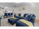 Spacious living area featuring comfortable seating, modern lighting, and stylish accents at 111 Buoy Ln # 392, Statesville, NC 28677