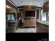 Comfortable living room with TV and modern finishes at 120 Cherokee Trl, Mount Gilead, NC 27306
