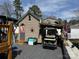 Charming shed with golf cart parked outside at 120 Cherokee Trl, Mount Gilead, NC 27306
