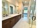 Modern bathroom with double vanity, quartz countertops, sleek fixtures, and glass shower at 174 Fulworth Nw Dr # 65, Concord, NC 28027