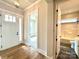 Bright entryway with hardwood floors, leading to bedroom and bathroom at 174 Fulworth Nw Dr # 65, Concord, NC 28027