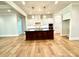 Spacious kitchen with a central island, white cabinetry, and modern appliances at 174 Fulworth Nw Dr # 65, Concord, NC 28027