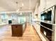 Modern kitchen featuring a large island, stainless steel appliances, and an open layout at 174 Fulworth Nw Dr # 65, Concord, NC 28027