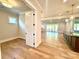 Hardwood floors spanning through living area and kitchen, flowing layout, bright lighting at 174 Fulworth Nw Dr # 65, Concord, NC 28027