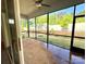 Relaxing screened porch featuring a ceiling fan and great views of the fenced backyard at 174 Fulworth Nw Dr # 65, Concord, NC 28027