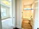 Bathroom featuring a tub and view to bedroom with carpeted floors at 178 Fulworth Nw Dr # 64, Concord, NC 28027