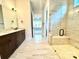Bathroom featuring dual sinks and a spacious glass shower at 178 Fulworth Nw Dr # 64, Concord, NC 28027