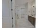 This bathroom has a glass shower, modern fixtures, and a neutral color palette at 178 Fulworth Nw Dr # 64, Concord, NC 28027