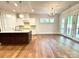 Open concept kitchen boasting an island with granite countertops and stainless steel appliances at 178 Fulworth Nw Dr # 64, Concord, NC 28027