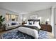 Inviting bedroom with a large window and a comfortable bed and stylish furniture at 1832 J Julian Ln # D, Charlotte, NC 28208