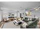 Bright living room featuring stylish furniture, modern decor, and an open layout at 1832 J Julian Ln # D, Charlotte, NC 28208