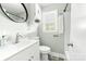 Bright bathroom featuring modern fixtures, mirror, sink, vanity and great lighting at 1905 Wood St, Gastonia, NC 28052