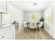 Bright dining room featuring a table and chairs and hardwood flooring at 1905 Wood St, Gastonia, NC 28052