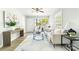 Bright living room with natural light, neutral walls, wood flooring, and comfortable seating at 1905 Wood St, Gastonia, NC 28052