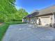 Spacious driveway with a three-car garage at 2030 Gloucester St, Weddington, NC 28104